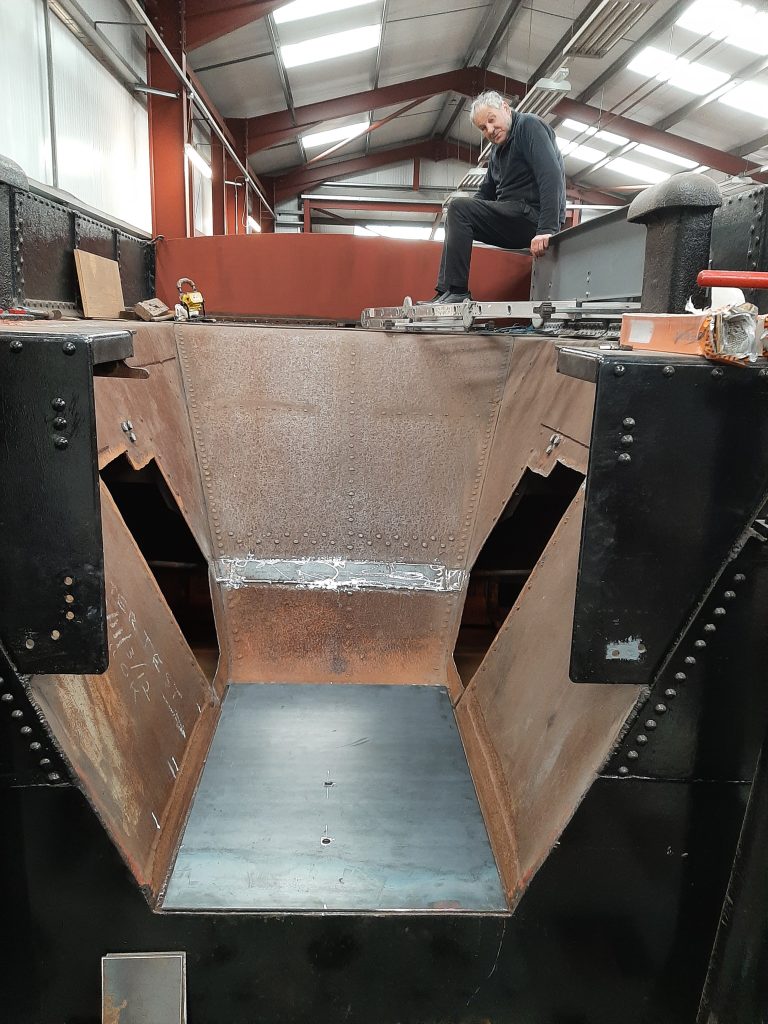 The coal space in Wootton Hall's tender tank with new steelwork ready to be welded in