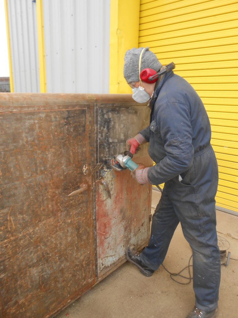 Mike cleaning up the new paint store