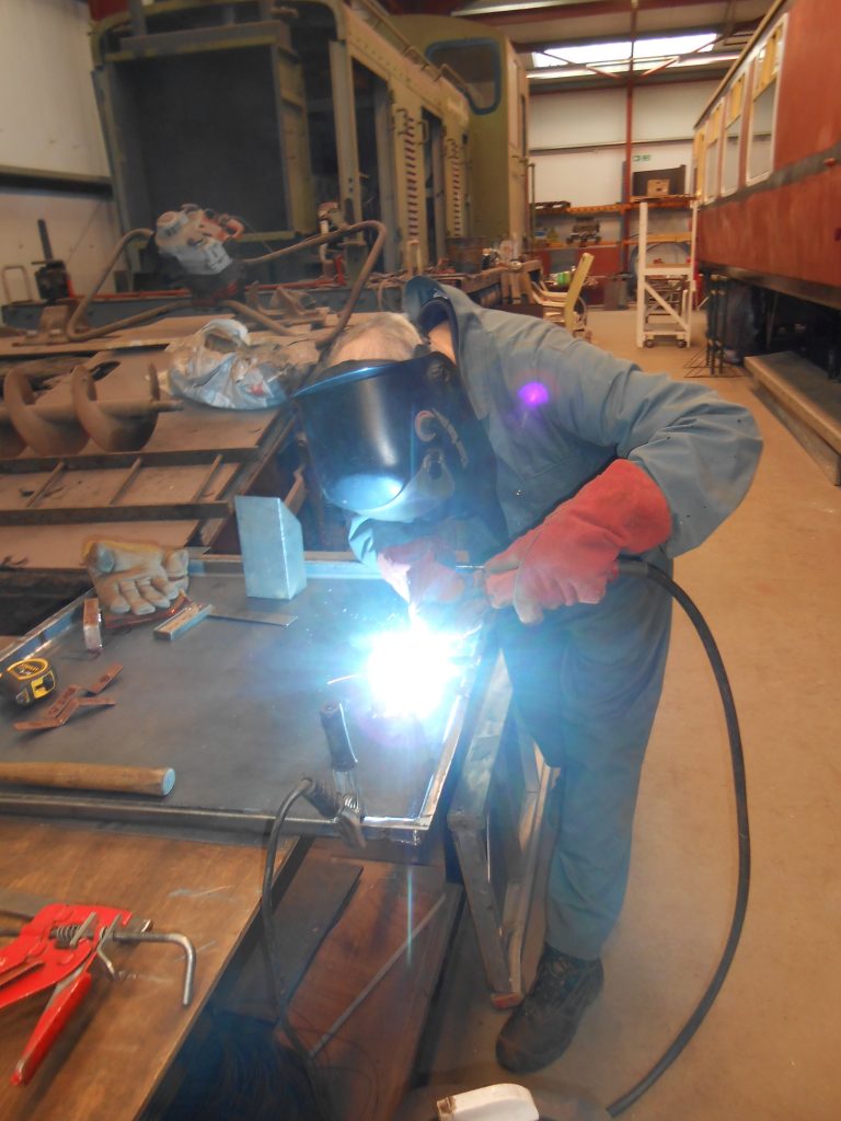 John welding the gas box handles