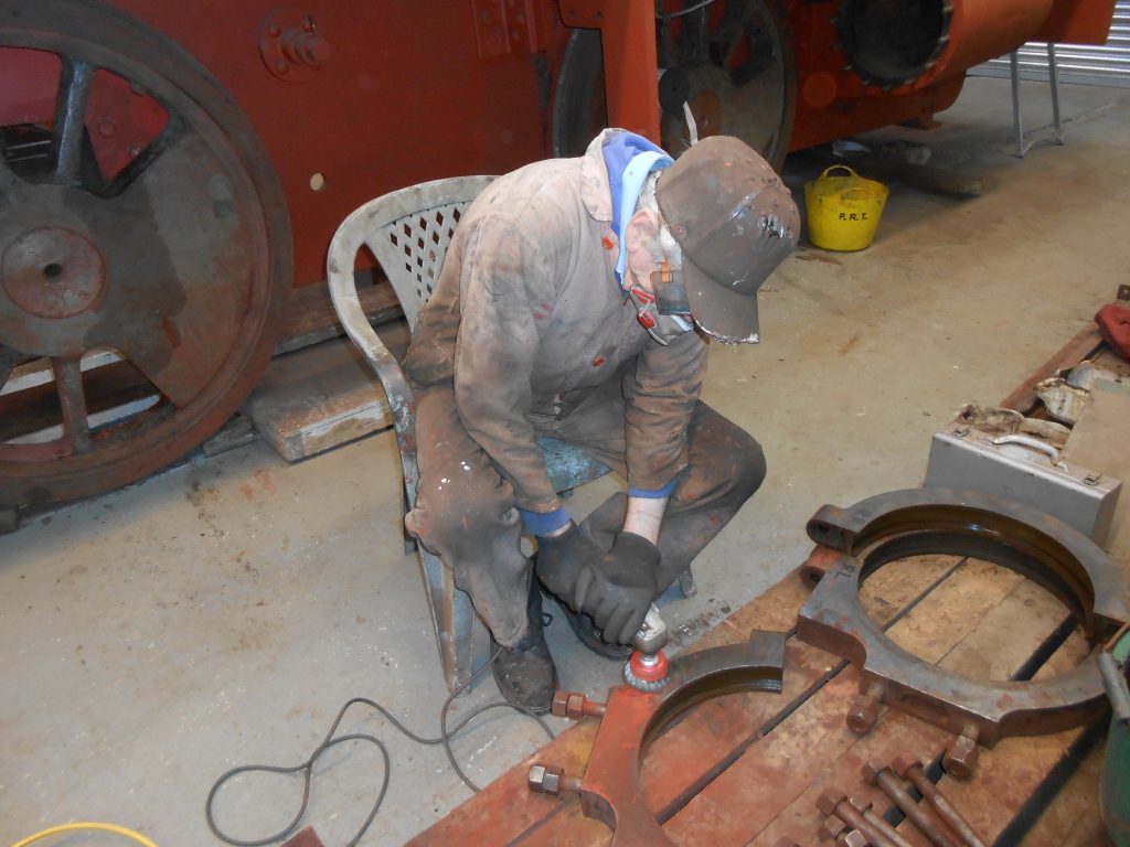 Fred making more dust, cleaning Caliban's eccentrics