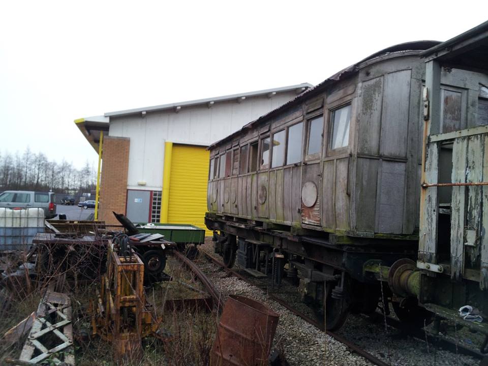 The NLR First Class Carriage mounted on the steam heat van chassis pending restoration