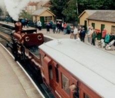 Furness Railway Number 20 waits departure from Pickering with another fully loaded train