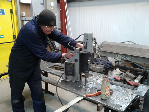 Keith at work drilling holes in Wootton Hall’s new rear drag box back plate
