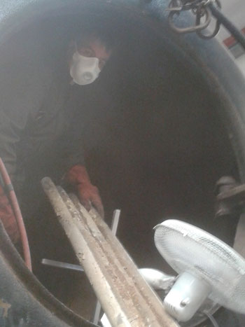 George removing more of 4979's old boiler tubes.