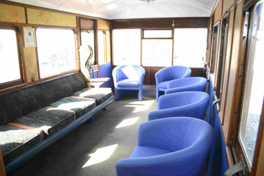 The second saloon. The notice between the windows details the vehicle's history