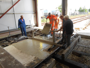 Oh everyone does love pouring concrete . This time back inside the Ribble Rail shed